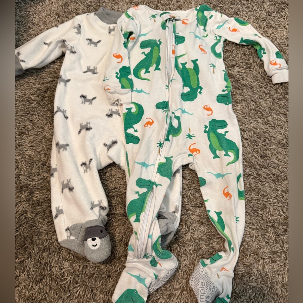Set of 2 Carter's Footies pajamas - raccoon and dinosaur